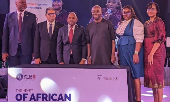 L-R: Chief Executive Officer Pan-African Payment and Settlement System (PAPSS) Mr. Mike Ogbalu III; Executive Vice President Global Trade Bank, Afreximbank, Mr. Haytham El Maayergi; Chief Executive Officer PAPSSCARD, Mr. Bosco Sebabi; Managing Director/CEO Unified Payments Limited Dr. Agada Apochi; Group Head Pay Attitude Business, Unified Payments Limited, Mrs. Onyeje Omeliko and Director Corporate Services, Unified Payments Limited, Mrs Vivian Okolo during the signing of partnership agreement between Unified Payments Limited and PAPSSCARD at the 2025 PAPSS COWRY Conference on Worldwide and Regional Payment in Lagos today